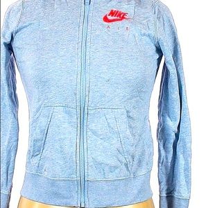 This is a light blue Nike zip up jacket. In size medium.
